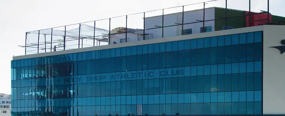 Body Shop Athletic Club glass items architecture business office contemporary window outdoors sky city building finance futuristic facade reflection perspective large steel modern travel