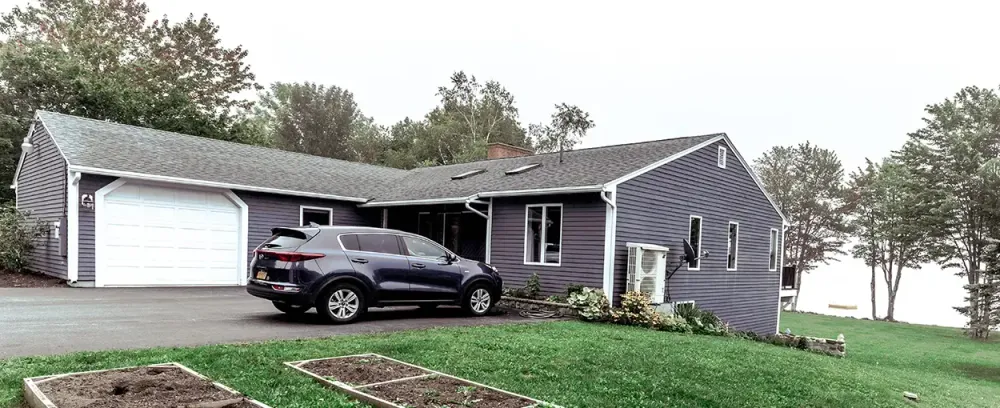 Scott Residence garage driveway home car house yard luxury front family roof blacktop classic lawn suburban property pavement door architecture tree