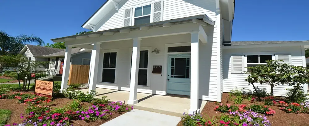 Tyson Home home porch house family architecture yard window suburban door luxury suburb garden patio property residential upscale entrance balcony real