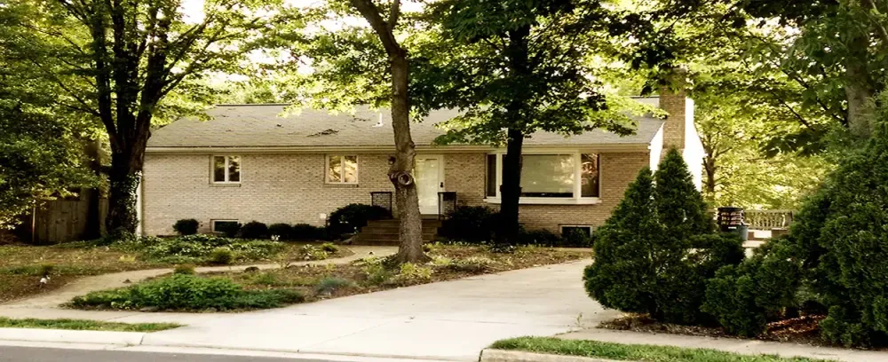 Zang Residence home house driveway lawn tree family yard property suburban architecture building realty window garden estate suburb front class mortgage