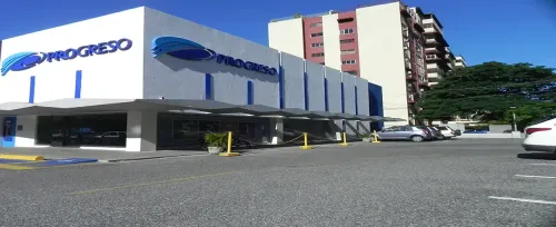 Banco del Progreso business architecture parking lot building street outdoors modern industry commerce travel daylight road car transportation system city competition signal stock