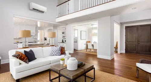 What to Know About Building High-Performance Homes contemporary indoors luxury sofa family room spacious apartment parquet minimalist seat comfort home coffee table chair table